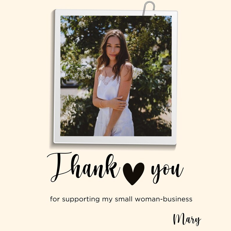 May include: A woman in a white dress stands in front of a green bush. The image is in a white frame with a silver clip at the top. The text "Thank you" with a black heart in between the words is below the image. The text "for supporting my small woman-business" is below the text "Thank you". The name "Mary" is at the bottom of the image.