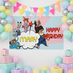 May include: A colorful birthday banner featuring cartoon characters, the name "MARY", and the words "HAPPY BIRTHDAY". The banner is decorated with balloons and a garland of triangular flags. Pink, blue, yellow, and green are the dominant colors.