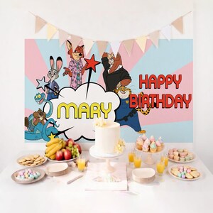 May include: A birthday party scene with a backdrop featuring cartoon characters and the words "Happy Birthday" and "Mary." The table is set with a cake, cupcakes, cookies, fruit, and juice. A banner of triangular flags hangs above.