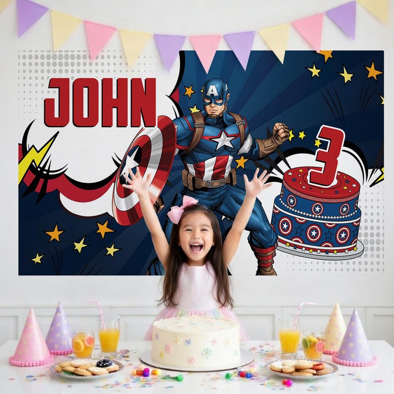 May include: A birthday party scene with a young girl in a pink dress, arms raised, in front of a Captain America backdrop. The backdrop features the name "JOHN" and a cake with a "3" on top. A table is set with a cake, snacks, and party hats.