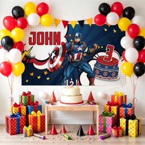 May include: A birthday party scene with a Captain America theme. The backdrop features Captain America and the name "JOHN". Balloons in red, yellow, black, and white surround the scene. A cake with candles and wrapped gifts are on display.