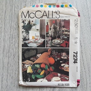 May include: Vintage McCall's sewing pattern for a cornucopia centerpiece. The pattern is for a one-size cornucopia filled with fruit and vegetables. The pattern number is 7274 and the price is $2.50.