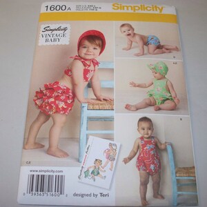 May include: Simplicity Vintage Baby sewing pattern 1600A for a baby's outfit. The pattern includes a red and white floral print romper, a green floral print romper, and a red and white floral print swimsuit. The pattern is designed by Teri.