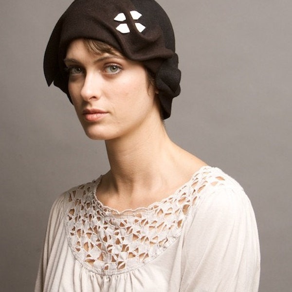 two-tone black and brown cloche with white detail