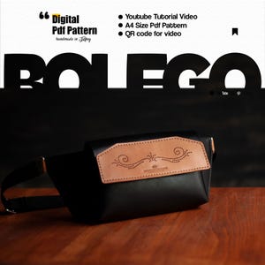 May include: Black leather fanny pack with a tan leather flap featuring a decorative design. The bag has a long adjustable strap and a gold-colored buckle. The image also includes text that says "Digital Pdf Pattern handmade in Turkey".