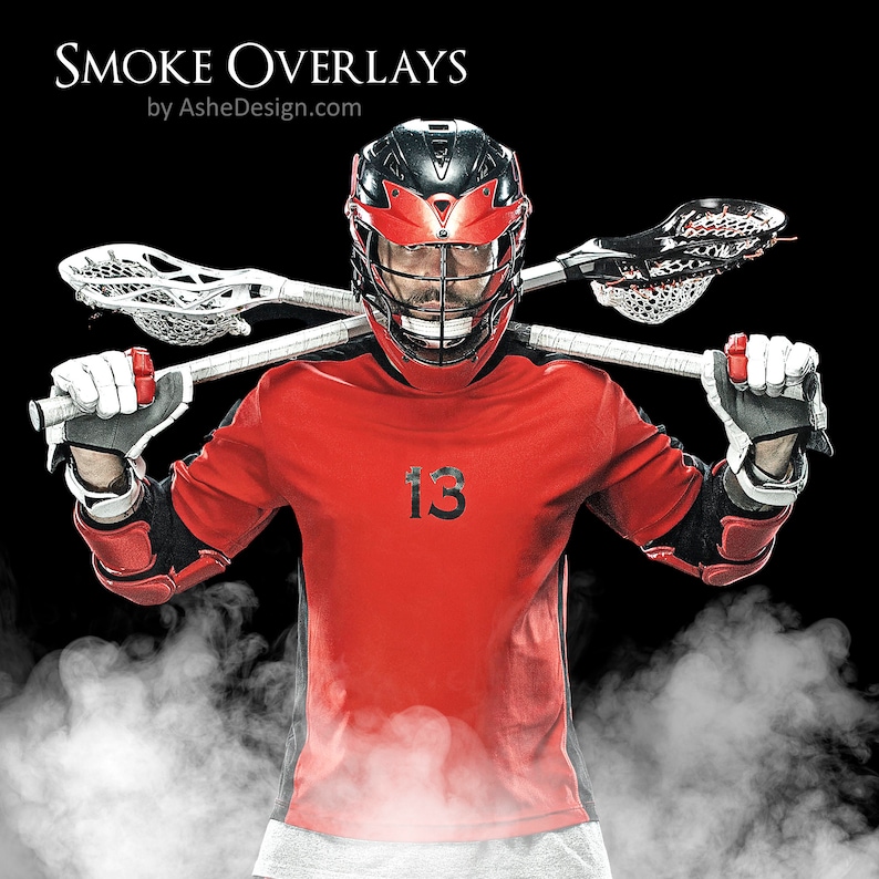May include: A lacrosse player wearing a red jersey with the number 13 on the front, a black helmet with a red visor, and black and red protective gear. The player is holding two lacrosse sticks across their shoulders. The background is black with white smoke.