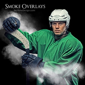 May include: A hockey player wearing a white helmet and green jersey holds a hockey stick with a black glove. The player is surrounded by white smoke.