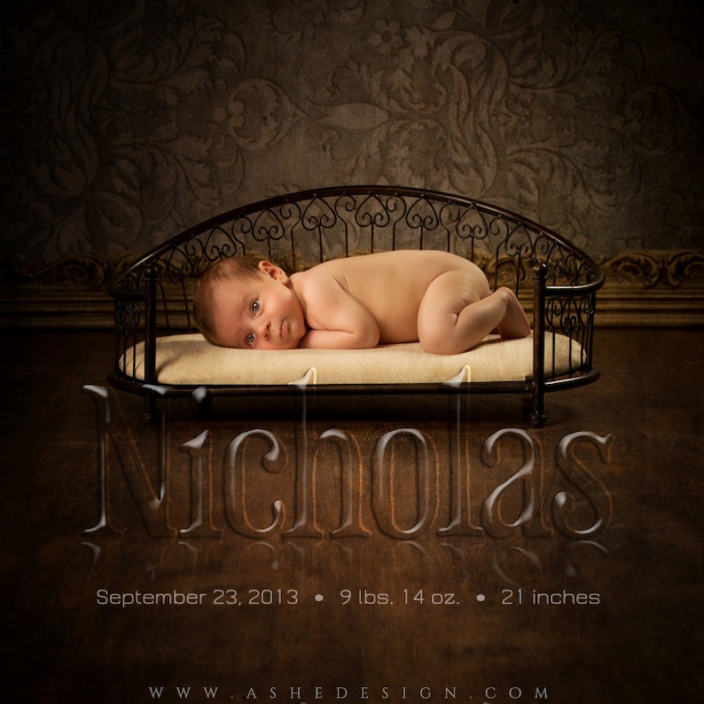 May include: A newborn baby boy named Nicholas is lying on a white padded bed inside a black metal crib. The baby is 9 lbs. 14 oz. and 21 inches long. The date September 23, 2013 is written below the name.