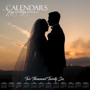 May include: A calendar overlay with a silhouette of a couple embracing, set against a sunset backdrop. The text "CALENDARS png overlays AsheDesign.com" is at the top. The year "Two Thousand Twenty Six" is at the bottom, with a calendar grid.