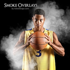 May include: A basketball player wearing a yellow jersey with a blue number 3, holds a basketball in front of a white smoke background.