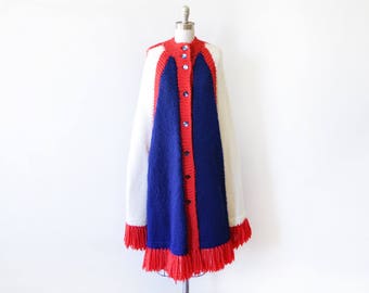 60s sweater cape, vintage 1960s red white and blue poncho, mod blanket poncho, knit sweater fringe poncho,