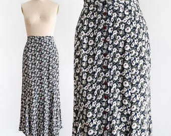 Falda larga vintage de los años 90, azul marino y blanca con estampado floral, talla mediana/mediana grande.