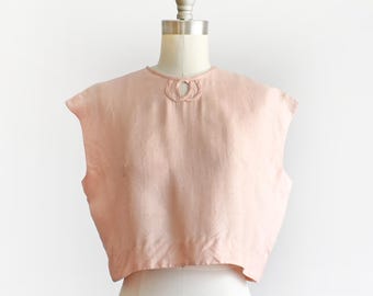 Blusa corta de seda rosa vintage de los años 50/60, talla mediana-grande.