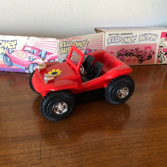 toy car that flips over when it hits a wall