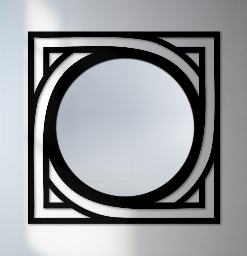 modern abstract metal frame wall mirror in black, architectural design for entryway
