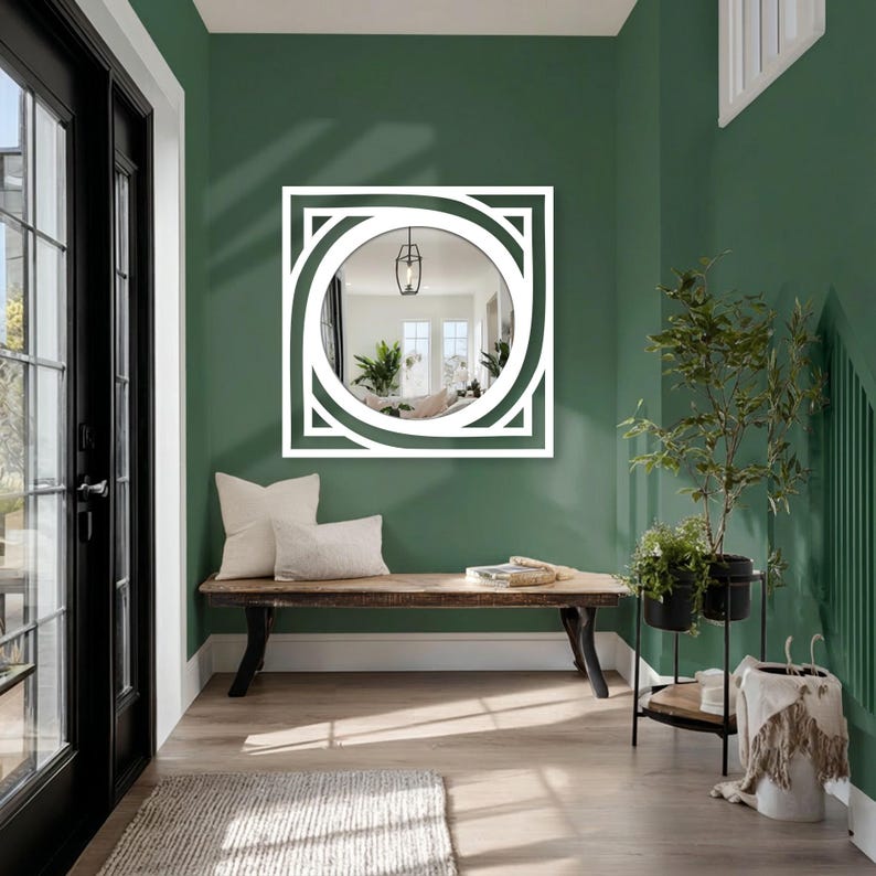 contemporary round wall mirror with black metal square frame, minimalist modern interior accent