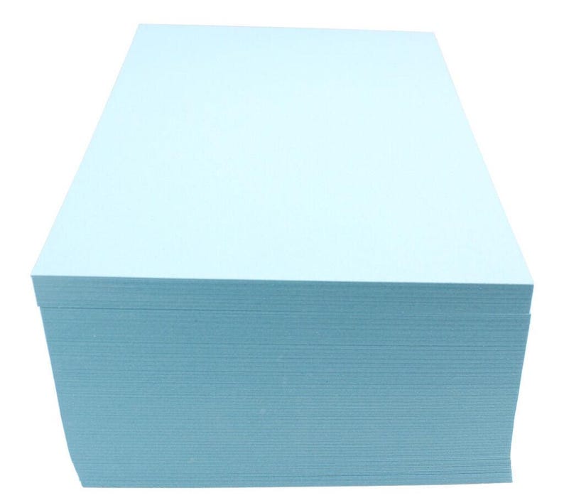 May include: A stack of light blue cardstock paper.