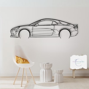 May include: A black line art silhouette of a car on a white wall. The car is a sports car with a low profile and a sleek design. The car is hanging on the wall as a metal wall decor piece. There is a white chair and two white side tables in the foreground.