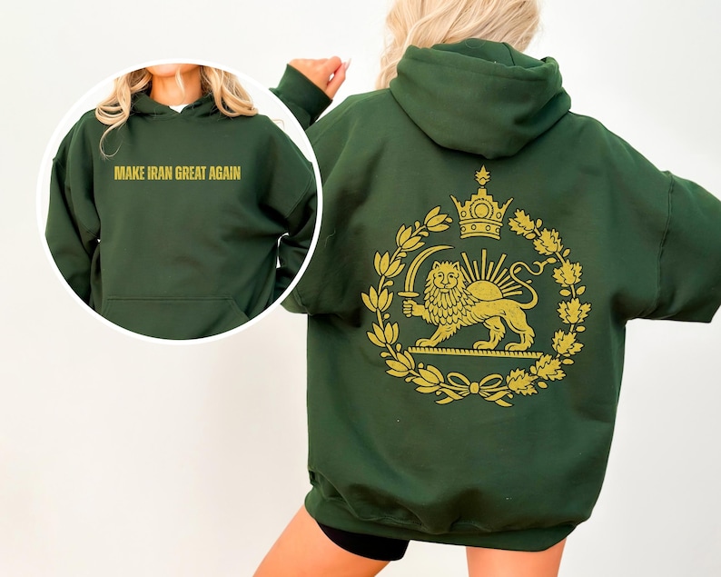 May include: Dark green hoodie with the text "MAKE IRAN GREAT AGAIN" in gold lettering on the front. The back features a gold emblem with a lion, crown, and sun design. The hoodie has a hood and a front pocket.