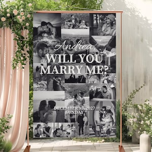 Pode incluir: Uma faixa a preto e branco com o texto "Andrea, Queres casar comigo?" e uma colagem de fotos. A faixa é exibida em um suporte cor de cobre, perfeito para um pedido de casamento ou um casamento. A data "12 de dezembro de 2027" também é visível.