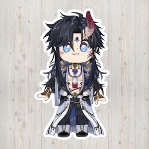 May include: A sticker featuring a stylized anime character with black hair, blue eyes, and a red horn. The character wears a detailed outfit with gold accents, a long white coat, and a necklace. The sticker has a white border and is set against a wood grain background.