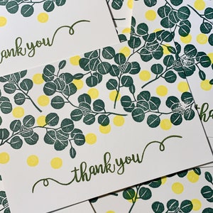 A sample image of handmade thank you cards created with hand carved rubber stamps available in the shop including circle stamp, eucalyptus stamp and thank you stamp.