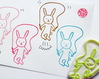 Rabbit doing jump rope rubber stamp, Cute animal stamp, Hand carved stamp by talktothesun