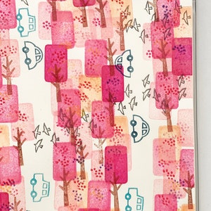 May include: A white background with a repeating pattern of pink and orange squares with brown tree trunks and branches.  Small gray birds are flying between the trees.  There are also small blue cars with white wheels.