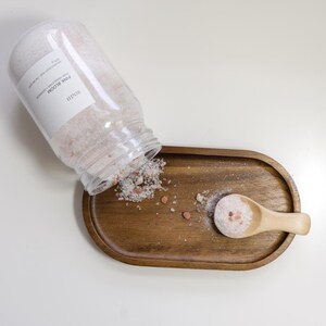 Minimalist mineral bath salt set styled as a spa gift box for women and summer self-care gifting.