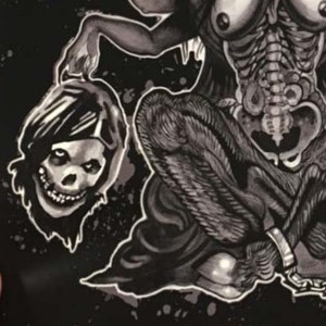 May include: A black and white illustration of a demonic figure with horns and a skeletal face, holding the severed heads of four people. The figure is sitting in a meditative pose with its legs crossed. The background is a black and white speckled pattern.