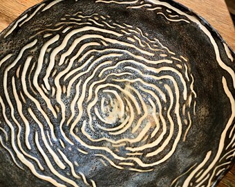 Handmade bowl with vortex pattern