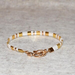 Golden Hematite and Pearl like glass Tila Bead Bracelet  size 7.5