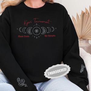 Kejari Tournament besticktes Sweatshirt Kronen von Nyaxia Carissa Breitbent offiziell lizenziert