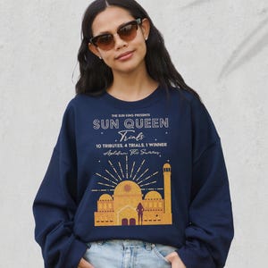 Bluza z plakatem Trial of the Sun Queen Artefakty Ouranos Nisha J Tuli Heart Queen