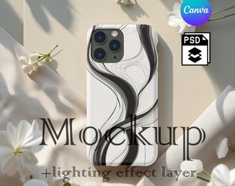 May include: A white phone case with a black abstract design. The case has a camera lens cutout and the text "Mockup" is printed on the bottom of the case.