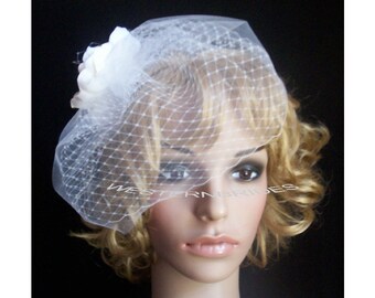 DOUBLE LAYER bridal tulle and Russian net face veil . Brand new with comb ready to wear