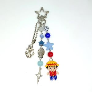 Luffy One Piece keychain – Handmade anime bag charm – Gift for anime lover – Straw Hat Pirates fan merch