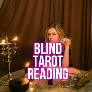 May include: A woman holding a sign that reads "BLIND TAROT READING" in white letters with a purple glow. The scene includes lit candles, a candelabra, and a table with a decorative box. The background features brown curtains.