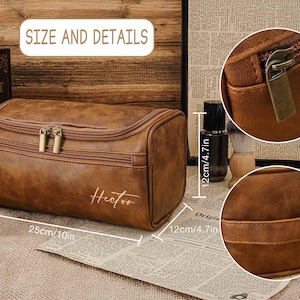 May include: A brown leather wash bag with a zipper closure and the name "Hector" printed on the front. The bag is 25cm long and 12cm high. The bag is on a newspaper.