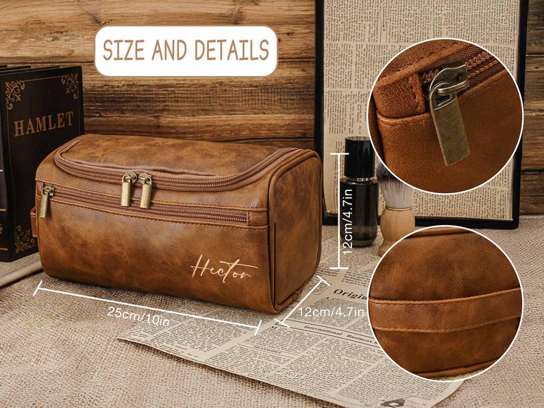 May include: A brown leather wash bag with a zipper closure and the name "Hector" printed on the front. The bag is 25cm long and 12cm high. The bag is on a newspaper.