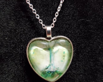 Meditating Skeleton Green Silver Heart Pendant Necklace Cabochon,  Hand embellished Original Artwork by Artist Heather Calderon
