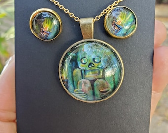 Tiki Man plus Tiki light Earrings Set (Hand painted/Embellished) Pendant Cabochon Necklace Original Artwork by Artist Heather Calderon