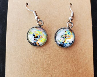 Beach Skeleton, Dangle Circle Cabochon Earrings Hand Embellished Original, one of a kind by Artist Heather Calderon