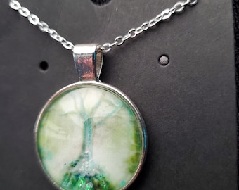 Meditating Skeleton under Tree, Green Silver Circle Pendant Necklace Cabochon,  Hand embellished Original Artwork by Artist Heather Calderon