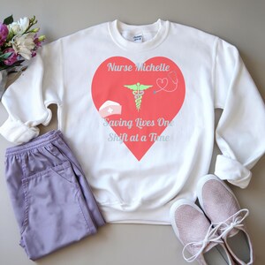 Custom Nurse Sweatshirt, Cute Nurse Shirt, RN Registered Nurse Hoodie, Nursing School Tshirt, Work Nurse Apparel, Holiday Nurse Gift