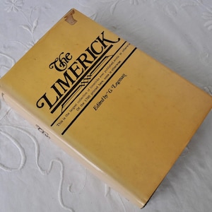 May include: A vintage book titled "The Limerick" with a yellow cover. The title is in large, stylized black lettering. The cover also includes text about the collection of limericks and the editor, G. Legman.