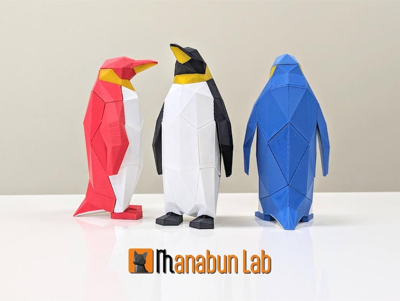 May include: Three penguin figurines made of geometric shapes. The penguins are red, white, and blue.