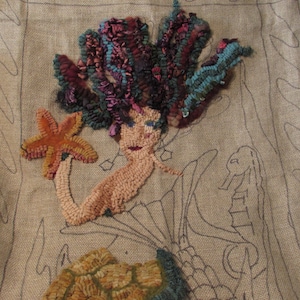 Tapijthaakset zeemeermin gedeeltelijk voltooide wol en primitief linnen Pris Buttler