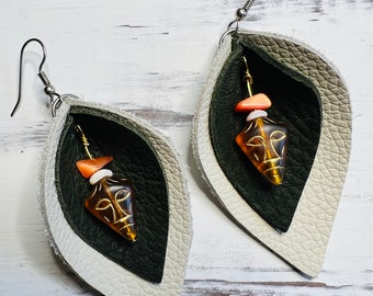 Juanita's Feather Weight Travel Earrings - Tiki Face