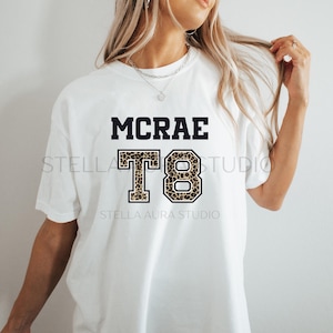 Tate McRae Comfort Colors T-shirt en jersey | Chemise imprimée léopard T8 | Maillot McRae Tour | Produits dérivés pour fans de musique pop | t-shirt concert | Cadeau tendance pour les fans